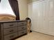 Bedroom with a dresser and closet at 3804 Janie Ct, Orlando, FL 32822
