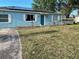 Quaint home featuring a well-maintained lawn and charming front yard space at 3804 Janie Ct, Orlando, FL 32822