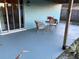 Charming patio with cozy seating, perfect for enjoying the outdoors at 3804 Janie Ct, Orlando, FL 32822