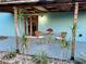 Backyard patio with seating and landscaping at 3804 Janie Ct, Orlando, FL 32822