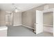 Bedroom with a ceiling fan and neutral carpet at 7573 Laureate Blvd # 1301, Orlando, FL 32827