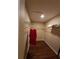 Walk-in closet with rod and wire shelf for organized storage at 1611 Sand Key Cir, Oviedo, FL 32765