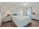 Charming bedroom with a full-size bed and butterfly decor at 7438 Floral W Cir, Lakeland, FL 33810