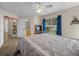 Spacious bedroom with large windows and plush carpeting at 7438 Floral W Cir, Lakeland, FL 33810