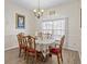 Formal dining room with wooden table and chairs at 7438 Floral W Cir, Lakeland, FL 33810