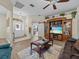 Bright and airy living room with hardwood floors at 7438 Floral W Cir, Lakeland, FL 33810