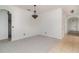 Spacious dining room with neutral color palette, carpet flooring, and a chandelier at 10064 Silver Laurel Way, Orlando, FL 32832