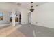 Spacious dining room with neutral color palette, carpet flooring, and a chandelier at 10064 Silver Laurel Way, Orlando, FL 32832