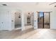 Hallway with access to other rooms and backyard at 10064 Silver Laurel Way, Orlando, FL 32832