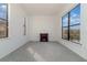 Living room with carpeting, fireplace, and large windows with a view at 10064 Silver Laurel Way, Orlando, FL 32832