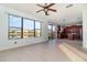 Living room with lake view and access to kitchen at 10064 Silver Laurel Way, Orlando, FL 32832