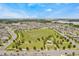 An aerial view of the community featuring a large recreational area, ponds, and meticulously planned homes at 16161 Parkwyn St, Winter Garden, FL 34787