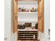 Wine cellar featuring wooden cabinets, shelves, and room for wine storage at 16161 Parkwyn St, Winter Garden, FL 34787