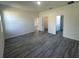 Spacious bedroom with multiple doorways and plenty of natural light at 4445 America St, Orlando, FL 32811