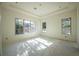 Bedroom showcasing large windows and natural light highlighting the spacious room at 1730 Winchester Dr, Winter Park, FL 32789