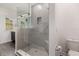 Bathroom features a glass enclosed shower with a built-in niche at 2444 Lobelia Dr, Lake Mary, FL 32746