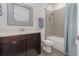 Bathroom featuring a dark wood vanity and shower/tub combination at 2444 Lobelia Dr, Lake Mary, FL 32746