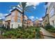 Beautifully landscaped townhomes with a lush green space at 2444 Lobelia Dr, Lake Mary, FL 32746