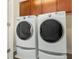 Laundry room features a front load washer and dryer set at 2444 Lobelia Dr, Lake Mary, FL 32746