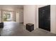 Hallway leading to unit 106, with textured walls and outdoor access featuring a small bench at 12855 Madison Pointe Cir # 106, Orlando, FL 32821