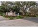 Community entrance sign for Discovery Palms with lush landscaping surrounding the brick and stone structure at 12855 Madison Pointe Cir # 106, Orlando, FL 32821