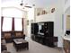 Spacious living room with entertainment center and comfortable seating at 320 Henley Cir, Davenport, FL 33896