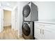 Modern laundry room with Whirlpool stackable washer and dryer at 648 Brechin Dr, Winter Park, FL 32792