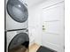 Bright laundry room with new Whirlpool washer and dryer set at 648 Brechin Dr, Winter Park, FL 32792