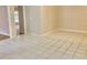 Bright dining area with tile flooring and access to other rooms at 5610 King James Ave, Leesburg, FL 34748