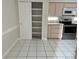 Kitchen with stainless steel appliances and a convenient pantry provides ample storage at 5610 King James Ave, Leesburg, FL 34748