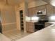 Kitchen with stainless steel appliances and ample cabinetry at 5610 King James Ave, Leesburg, FL 34748