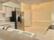 Modern kitchen with stainless steel appliances and double sink at 5610 King James Ave, Leesburg, FL 34748