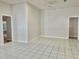 Spacious and bright living space with tile flooring and neutral walls and ceilings provides a welcoming atmosphere at 5610 King James Ave, Leesburg, FL 34748