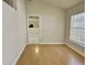 Living room with hardwood floors and natural light at 5610 King James Ave, Leesburg, FL 34748