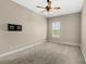 Spacious bedroom with neutral walls and carpet flooring at 31722 Red Tail Blvd, Sorrento, FL 32776