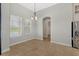 Bright breakfast nook with tile flooring and view of backyard at 31722 Red Tail Blvd, Sorrento, FL 32776