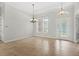 Bright dining room with tile floors and a chandelier at 31722 Red Tail Blvd, Sorrento, FL 32776