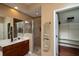 Main bathroom with shower and walk-in closet at 898 Arbormoor Pl, Lake Mary, FL 32746