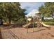 Playground with slides, climbing toys, and swings at 898 Arbormoor Pl, Lake Mary, FL 32746