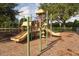 Community playground with slides and climbing structures at 898 Arbormoor Pl, Lake Mary, FL 32746