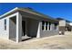 Side view of house, showcasing covered patio and AC unit at 1193 Basalt Ln, Sanford, FL 32771