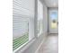 Close up of entrance and window with blinds showcasing abundant light at 1211 Teal Creek Dr, St Cloud, FL 34771