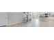 View from living area of open concept kitchen and stairs with modern decor at 1211 Teal Creek Dr, St Cloud, FL 34771