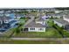 Aerial view of a well-maintained backyard with black metal fence and manicured lawn at 16744 Sanctuary Dr, Winter Garden, FL 34787