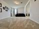 Spacious carpeted loft with ample natural light, perfect for relaxation or entertainment at 16744 Sanctuary Dr, Winter Garden, FL 34787