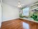 Bedroom with hardwood floors and a jungle mural at 1125 English Garden Se Ln, Winter Garden, FL 34787