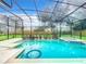 Enclosed pool area with spa and patio at 1125 English Garden Se Ln, Winter Garden, FL 34787