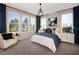 Bright bedroom showcases large windows, chic decor, and ample space, creating a serene retreat at 2122 Whitney Marsh Aly, Orlando, FL 32804