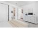 Bright bedroom featuring neutral walls, carpet, and ensuite bath access with a minimalist design at 2138 Whitney Marsh Aly, Orlando, FL 32804