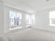Bright bedroom with neutral carpet, lots of windows, and light-filled space at 2138 Whitney Marsh Aly, Orlando, FL 32804